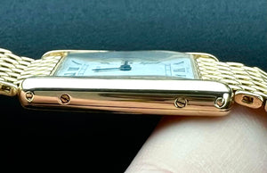 1980’s Cartier Tank Louis (Large) with ”grain de riz”-bracelet, solid 18k gold