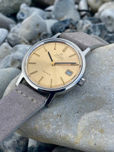 Load image into Gallery viewer, 1973 Pristine Omega Genève with Champagne dial. Near NOS