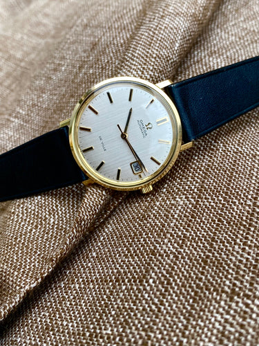 1967 Omega De Ville 18k solid gold in near NOS condition. Original strap, buckle and box