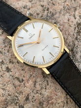 Load image into Gallery viewer, 1970 Omega Genéve in a solid 14k gold case