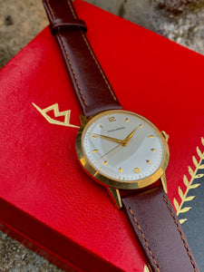 1966 Movado in 18k gold case, box, papers in flawless condition