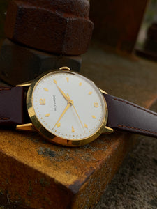 1966 Movado in 18k gold case, box, papers in flawless condition