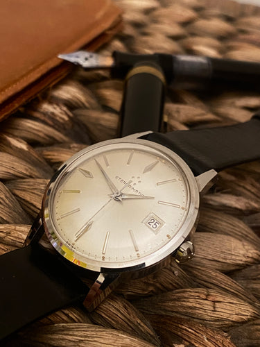 1960 NOS Eterna-Matic with sunburst dial, 34,5 mm case. Ref: 107 VT.