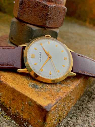 1966 Movado in 18k gold case, box, papers in flawless condition